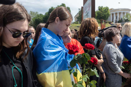 KYIV, UKRAINE - Jun. 18, 2022: War in Ukraine. Funeral Ceremony Of The Fallen Soldier And Activist Roman Ratushnyi. He was killed near Izyum while fighting for Ukrainian army against Russian invadersのeditorial素材