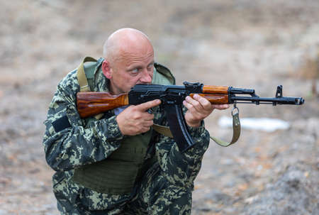 BUCHA, UKRAINE - Jun. 17, 2022: Members of the Bucha territorial defense unit, a support force to the regular Ukrainian army, take part in an exercise for the regular combat tactics classesのeditorial素材