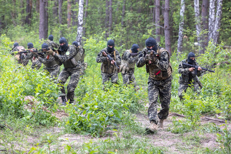 BUCHA, UKRAINE - Jun. 17, 2022: Members of the Bucha territorial defense unit, a support force to the regular Ukrainian army, take part in an exercise for the regular combat tactics classesのeditorial素材