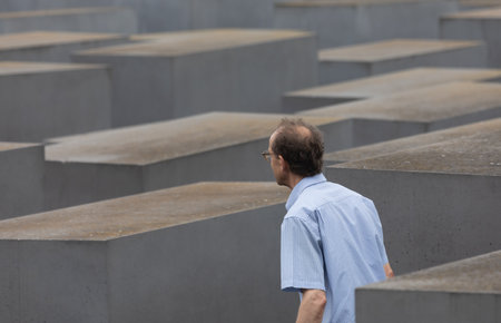 BERLIN, GERMANY - Jun. 28, 2022: Jewish man visiting the Holocaust memorial in Berlinのeditorial素材