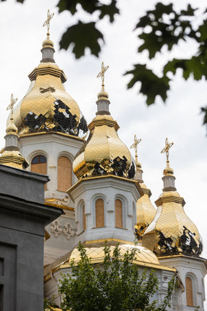 KHARKIV, UKRAINE - Jul. 30, 2022: Damaged domes of the church as a result of artillery shelling by Russian troops. Kharkiv during the war with the Russian Federation.のeditorial素材