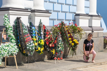 KYIV, UKRAINE - Aug. 25, 2022: Funerals of the Ukrainian soldier Yuriy Karakai who died from mortar fire in the battle in Kherson regionのeditorial素材