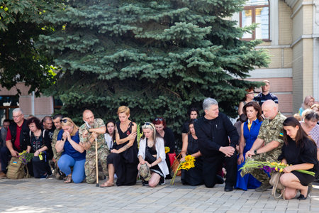 KYIV, UKRAINE - Aug. 25, 2022: Funerals of the Ukrainian soldier Yuriy Karakai who died from mortar fire in the battle in Kherson regionのeditorial素材