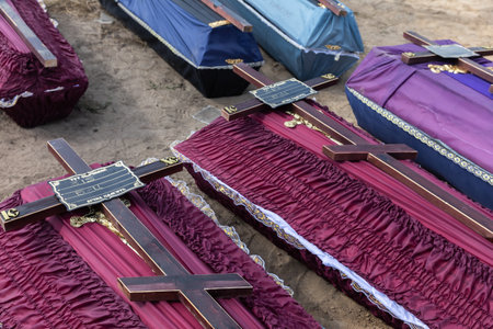 BUCHA, UKRAINE - Sep. 02, 2022: Burial of the remains of 13 unidentified and two identified people who were killed in the Bucha district during the Russian occupationのeditorial素材