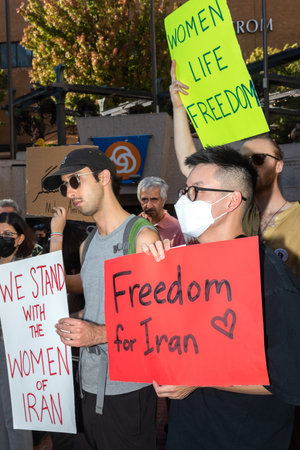 PORTLAND, OREGON, USA - Oct 15, 2022: People participate in a demonstration in solidarity with Iranian women and in memory of Mahsa Amini killed by the Iranian police.のeditorial素材