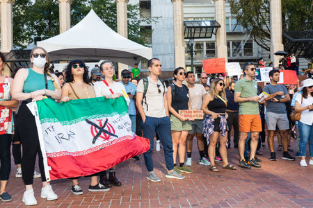 PORTLAND, OREGON, USA - Oct 15, 2022: People participate in a demonstration in solidarity with...