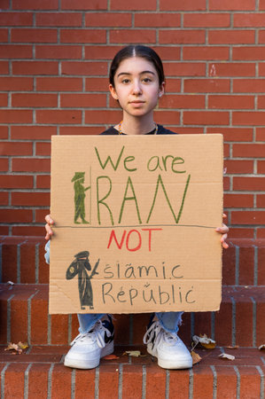 PORTLAND, OREGON, USA - Oct 15, 2022: People participate in a demonstration in solidarity with...