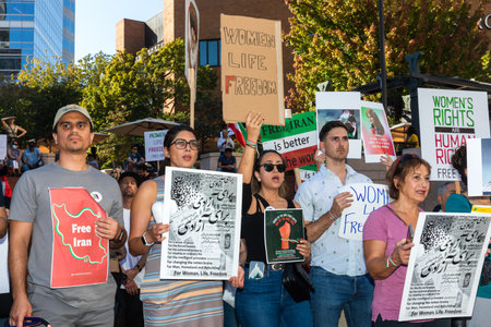 PORTLAND, OREGON, USA - Oct 15, 2022: People participate in a demonstration in solidarity with...