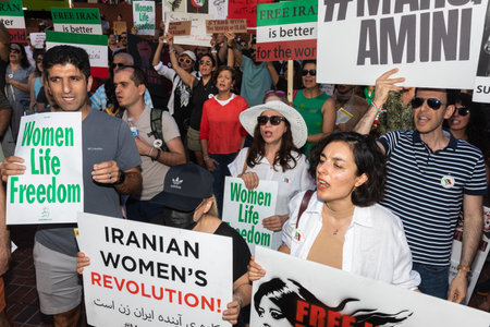 PORTLAND, OREGON, USA - Oct 15, 2022: People participate in a demonstration in solidarity with Iranian women and in memory of Mahsa Amini killed by the Iranian police.のeditorial素材