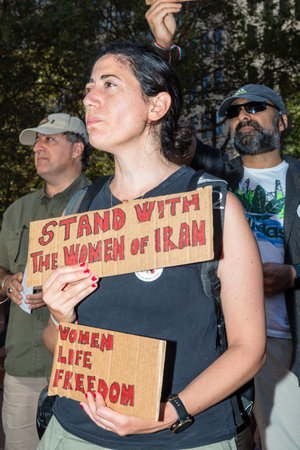 PORTLAND, OREGON, USA - Oct 15, 2022: People participate in a demonstration in solidarity with Iranian women and in memory of Mahsa Amini killed by the Iranian police.のeditorial素材