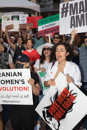 PORTLAND, OREGON, USA - Oct 15, 2022: People participate in a demonstration in solidarity with Iranian women and in memory of Mahsa Amini killed by the Iranian police.のeditorial素材