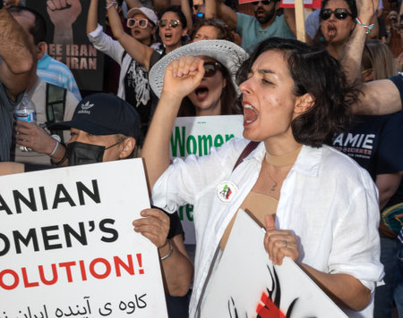 PORTLAND, OREGON, USA - Oct 15, 2022: People participate in a demonstration in solidarity with Iranian women and in memory of Mahsa Amini killed by the Iranian police.のeditorial素材