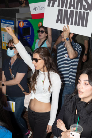 PORTLAND, OREGON, USA - Oct 15, 2022: People participate in a demonstration in solidarity with Iranian women and in memory of Mahsa Amini killed by the Iranian police.のeditorial素材
