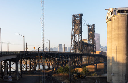 PORTLAND, OREGON, USA - Oct. 14, 2022: Portlands elevator and industrial infrastructure in the area of the Steel Bridge. Industrial Cityscape in Portland, West Coastのeditorial素材