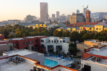 Portland, OR, USA - Oct 14, 2022: Rooftops of Portland houses and a view of the building of the railway transport complex Union Stationのeditorial素材