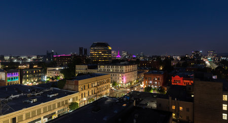 Portland, OR, USA - Oct 15, 2022: Rooftops and streets of Portland at nightのeditorial素材