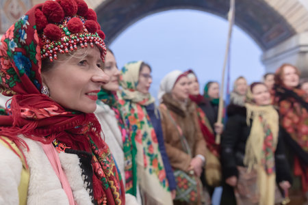 KYIV, UKRAINE - Dec. 25, 2022: Residents in Ukrainian folklore costumes sang carols inside a metro station in Kyiv on Christmas Day as an air raid alarm soundedのeditorial素材