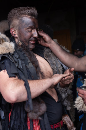 Krasnoilsk, Ukraine - January 14, 2018: Malanka or Generous Evening is a Ukrainian national and church holiday. Ancient pagan ritual of Malanka. People in festive carnival and national costumes.のeditorial素材