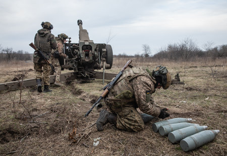 DONETSK REG., UKRAINE - Mar. 21, 2023: War of Russia against Ukraine. Artillerymen from the...