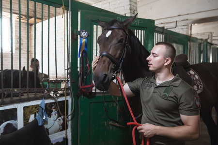 KYIV, UKRAINE - Aug. 23, 2023: Session of hippotherapy for Ukrainian soldiers who were in combat zones in Kyiv, Ukraineのeditorial素材