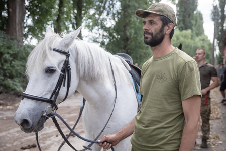 KYIV, UKRAINE - Aug. 23, 2023: Session of hippotherapy for Ukrainian soldiers who were in combat zones in Kyiv, Ukraineのeditorial素材