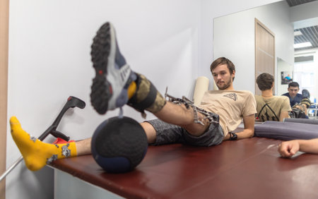 IRPIN, UKRAINE - Sep. 15, 2023: Military personnel injured in the war in Ukraine are seen undergoing rehabilitation at a rehabilitation centre Next Step Ukraine in Irpin, Ukraine.のeditorial素材