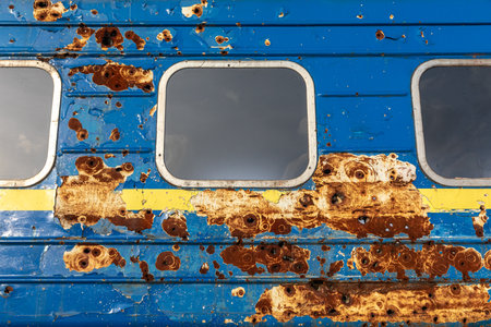 Traces of shelling by Russian troops are seen on a carriage of an evacuation train from Irpin, Kiev regionの写真素材