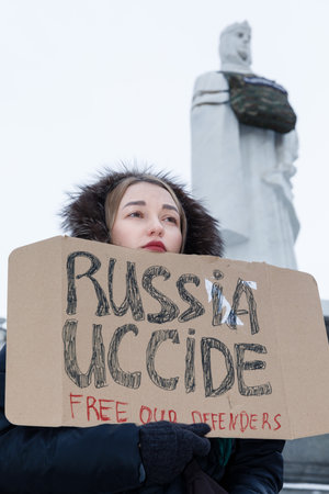 KYIV, UKRAINE - Jan. 07, 2024:  Relatives and friends of Ukrainian prisoners of war hold slogans which read "Free Azovstal defenders"のeditorial素材
