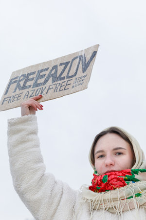 KYIV, UKRAINE - Jan. 07, 2024:  Relatives and friends of Ukrainian prisoners of war hold slogans which read "Free Azovstal defenders"のeditorial素材