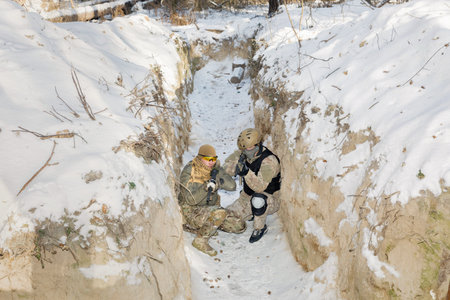 KYIV, UKRAINE - Jan. 12, 2024: Ukrainian civilians take part in the final exercise of an in-depth five-day course on preparing citizens for national resistance, amid the Russian invasion of Ukraine.のeditorial素材