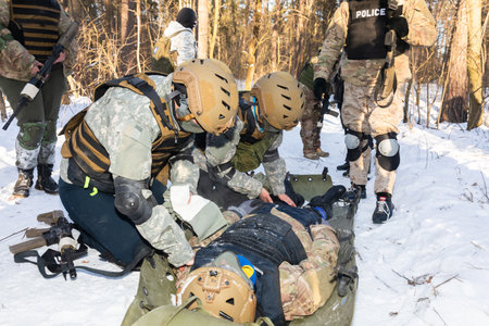 KYIV, UKRAINE - Jan. 12, 2024: Ukrainian civilians take part in the final exercise of an in-depth five-day course on preparing citizens for national resistance, amid the Russian invasion of Ukraine.のeditorial素材