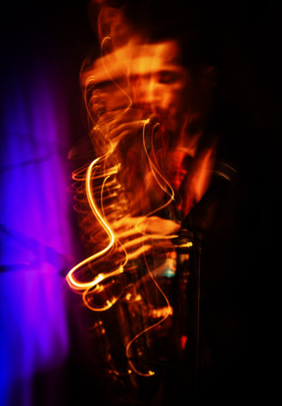 Jazz musicians improvise on stage. Intentionally motion blurred image.