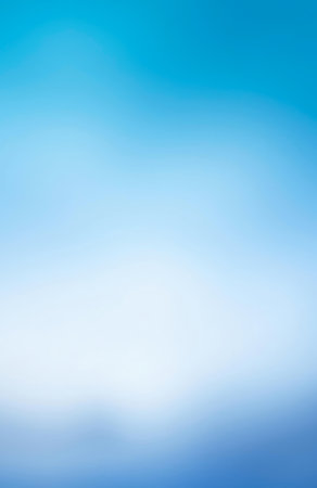 The soft blur of natural elements creates a calming atmosphere, with hues of blue and white merging seamlessly.の写真素材