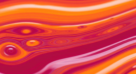 This close up view features mesmerizing swirls of color. It highlights the fluid nature of the paints with a warm, inviting palette.の写真素材