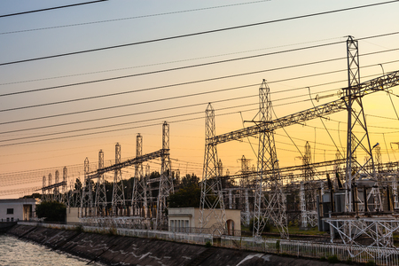 Power station. Transformer substation at sunsetの写真素材