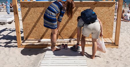 Odessa, Ukraine - May. 06, 2018: Summer vacation by the sea on the beach in Odessa. People are resting on the public city beachのeditorial素材