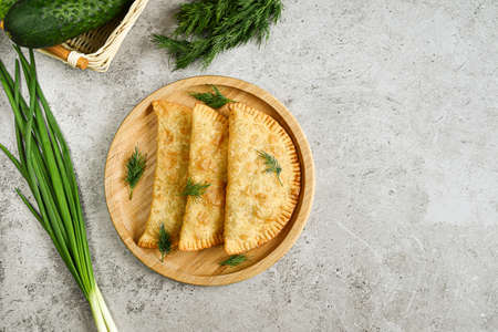 Food of Southern Europe, Latin America and the Philippines: crispy fried empanadas stuffed with...