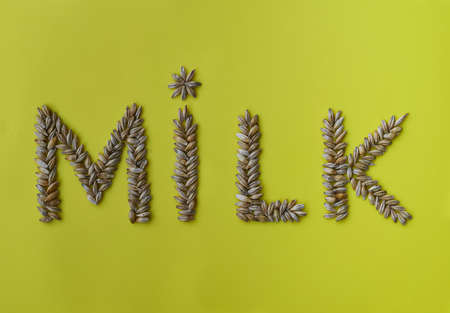 The inscription "milk" from barley grains, vegetable milk, top viewの写真素材