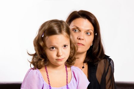 6 years old girl with her motherの写真素材