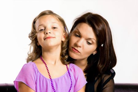 6 years old girl with her motherの写真素材