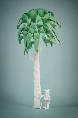 Paper origami tree with origami man. Paper art concept.の写真素材
