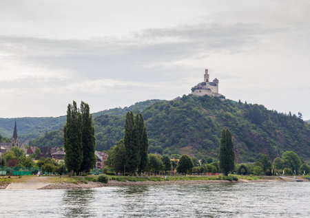 Rhine Valley, Germany - July 17,  2015: Marksburg castle overlooking Braubach and the Rhine river is the only knight's castle along the Rhine still sanding. It was photographed during a boat trip along the Rhine.のeditorial素材