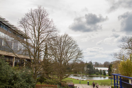 Bath, United Kingdom- March 24, 2014: University of Bath campus with a view towards the lake.のeditorial素材