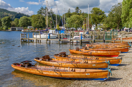 The wooden rowing boats in Ambleside on Lake Windermere, Cumbria were phtographed in an afternoon in early September 2015のeditorial素材