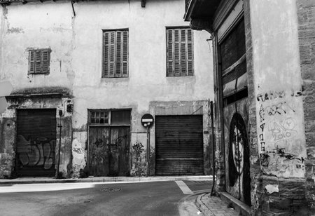 Nicosia, Cyprus - 18 February, 2016: Scenic streets and alleys in the Old Nicosia city centre in Black and White. The old city of Nicosia within the Venetian Walls is a perfect place to walk in back alleys and abandoned areas, in search of derelict buildiのeditorial素材