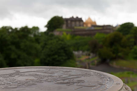 Map of Stirling Old Town, Scotland, on stone with Stirling Castle in the background.の写真素材