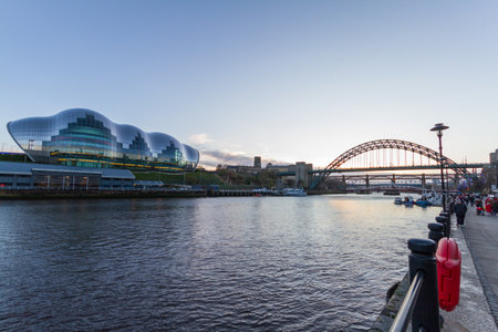 Newcastle, England - December 31, 2017: View of the river Tyne, Sage Gateshead concert hall and Tyne bridge at the Newcastle Quaysideのeditorial素材