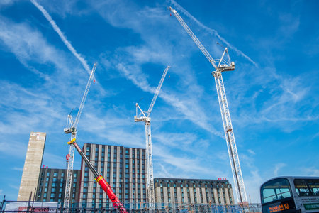 Manchester, United Kingdom - July 25, 2018: Extensive construction works in the city centre of Manchester. Greater Manchester is experiencing a building boom of new commercial buildings.のeditorial素材