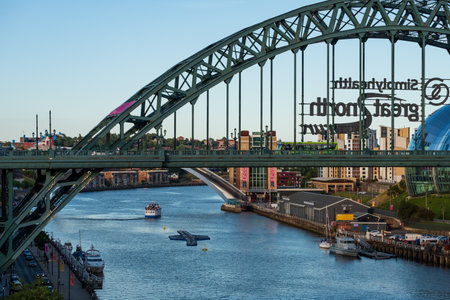 Newcastle, England - August 2, 2018: Newcastle city Skyline with Tyne Bridge in view at Newcastle Quayside on a summer afternoonのeditorial素材
