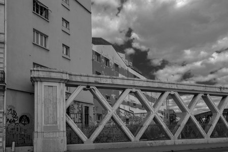 Paris, France - August 8, 2018: Buildings and bridge barrier on rue Lafayette, above the railways of gare de l'Estのeditorial素材